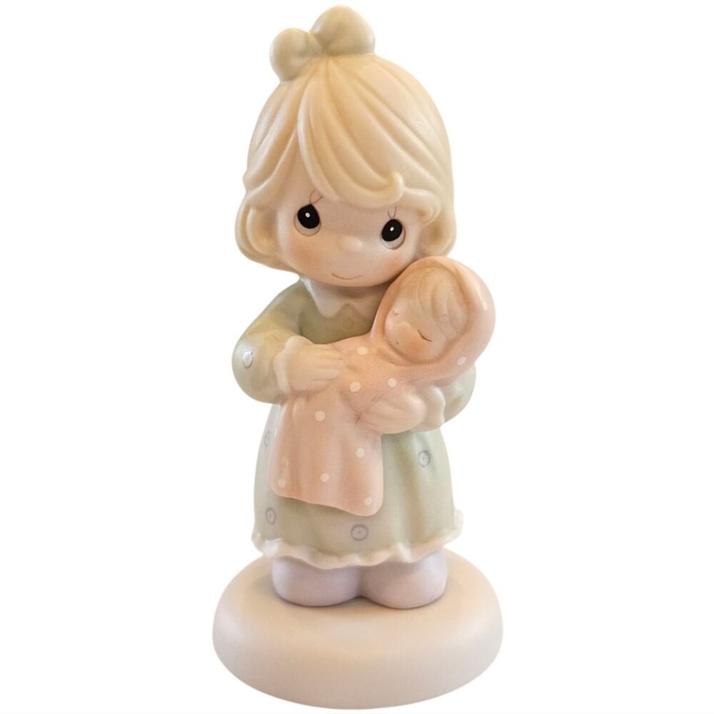 Precious Moments 1996 figurine titled "All Things Grow with Love" #139505